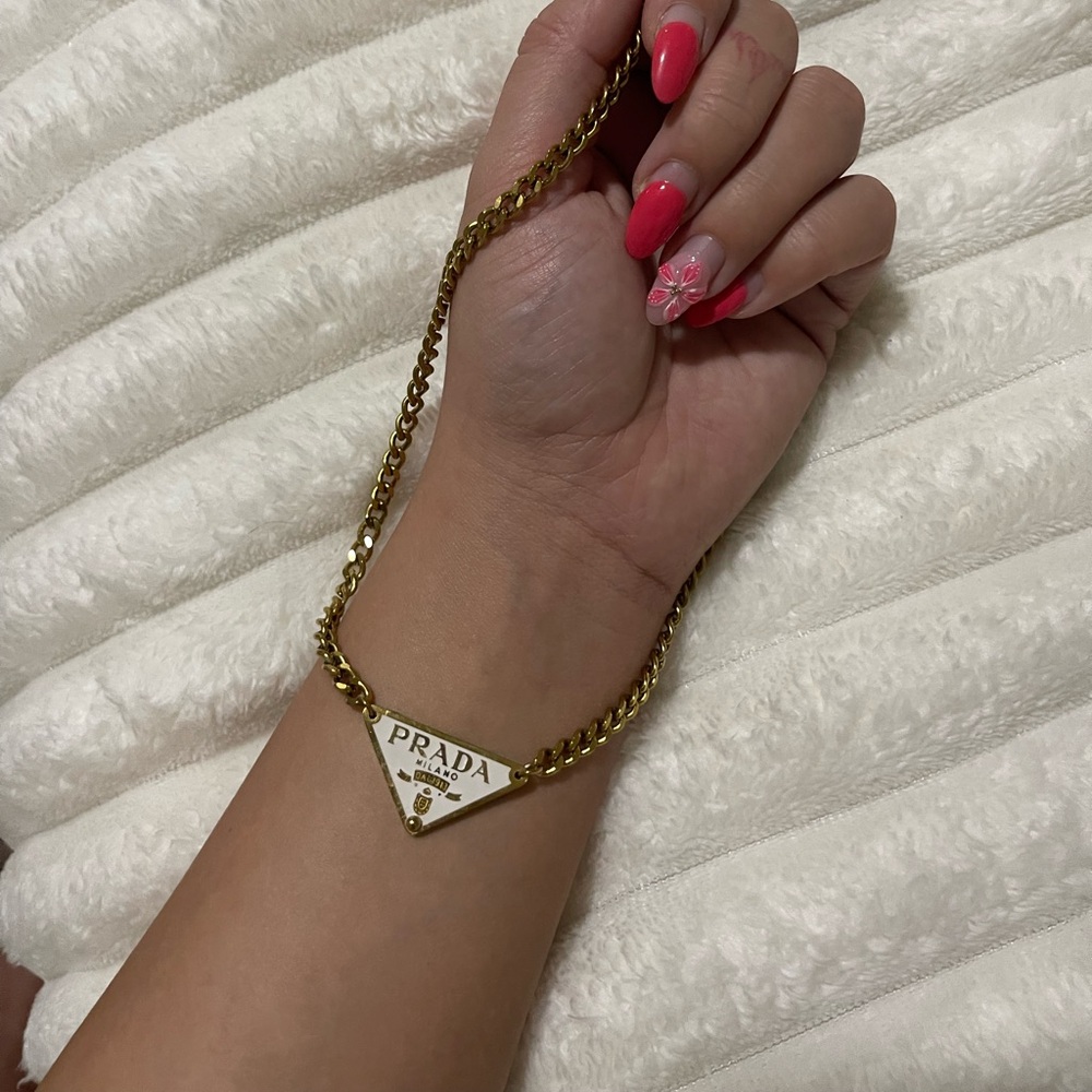 Prada Gold and White Triangle Necklace